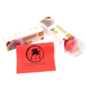 The professional latex rubber roll being attached to a fishing dart tool, highlighting its versatile use for various outdoor hobby and crafting applications beyond catapults.