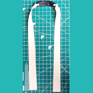 A before-and-after image showing a slingshot with a worn-out band next to the same slingshot with the new 20CM Mid Pull replacement.