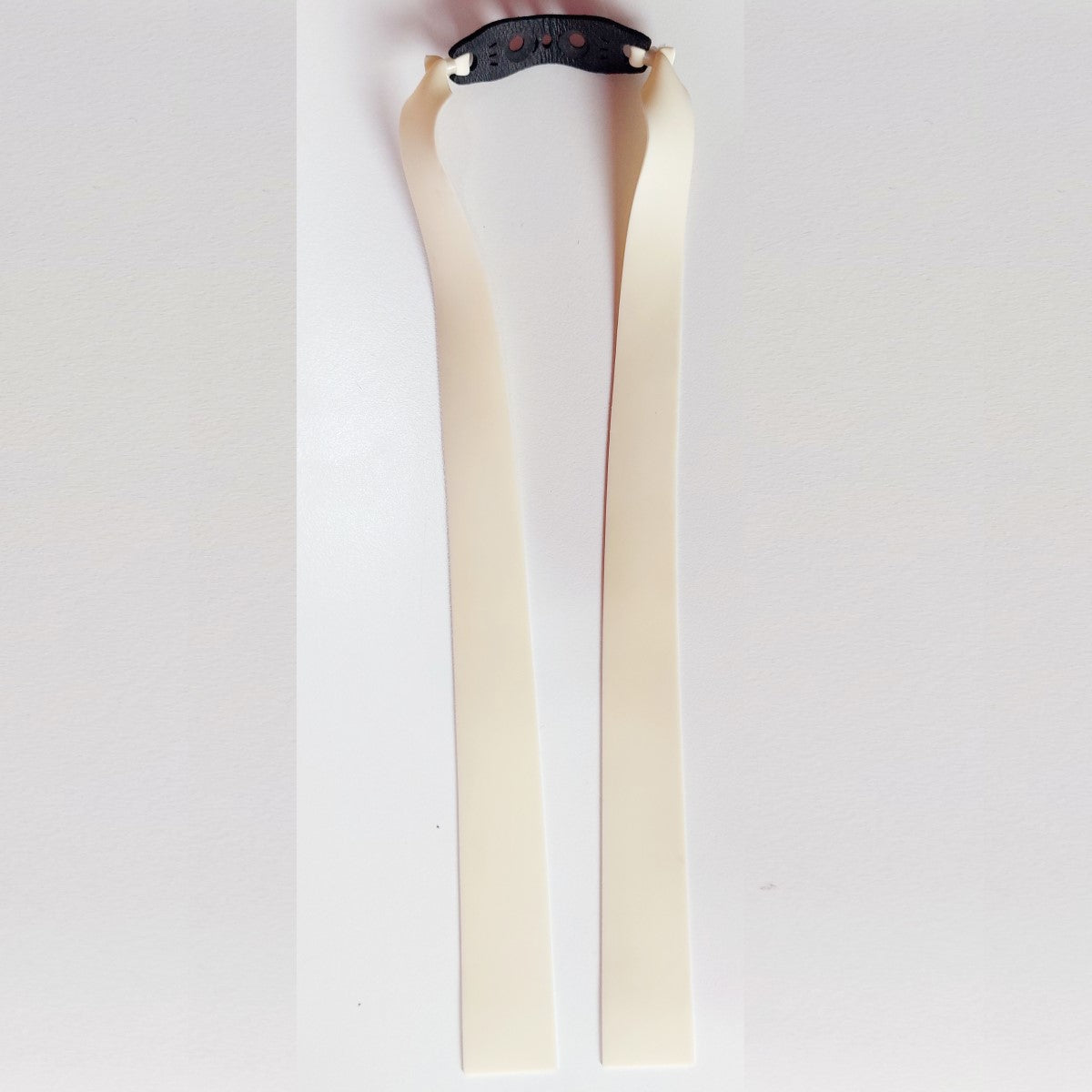 The lightweight replacement band shown on a digital scale, displaying its minimal weight of only 1.5 grams.


